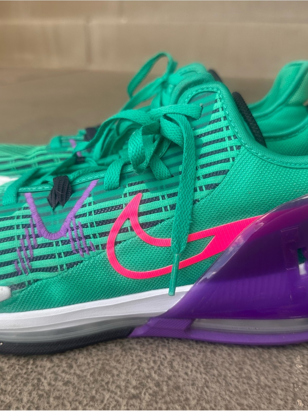 Nike Green Sneakers with Pink Swoosh and Purple Heel